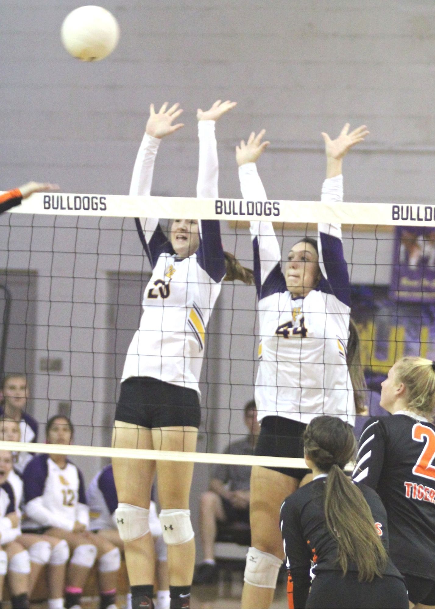 Volleyball Bell's Nicole Shepherd (20) and Taylor Tompkins (44)