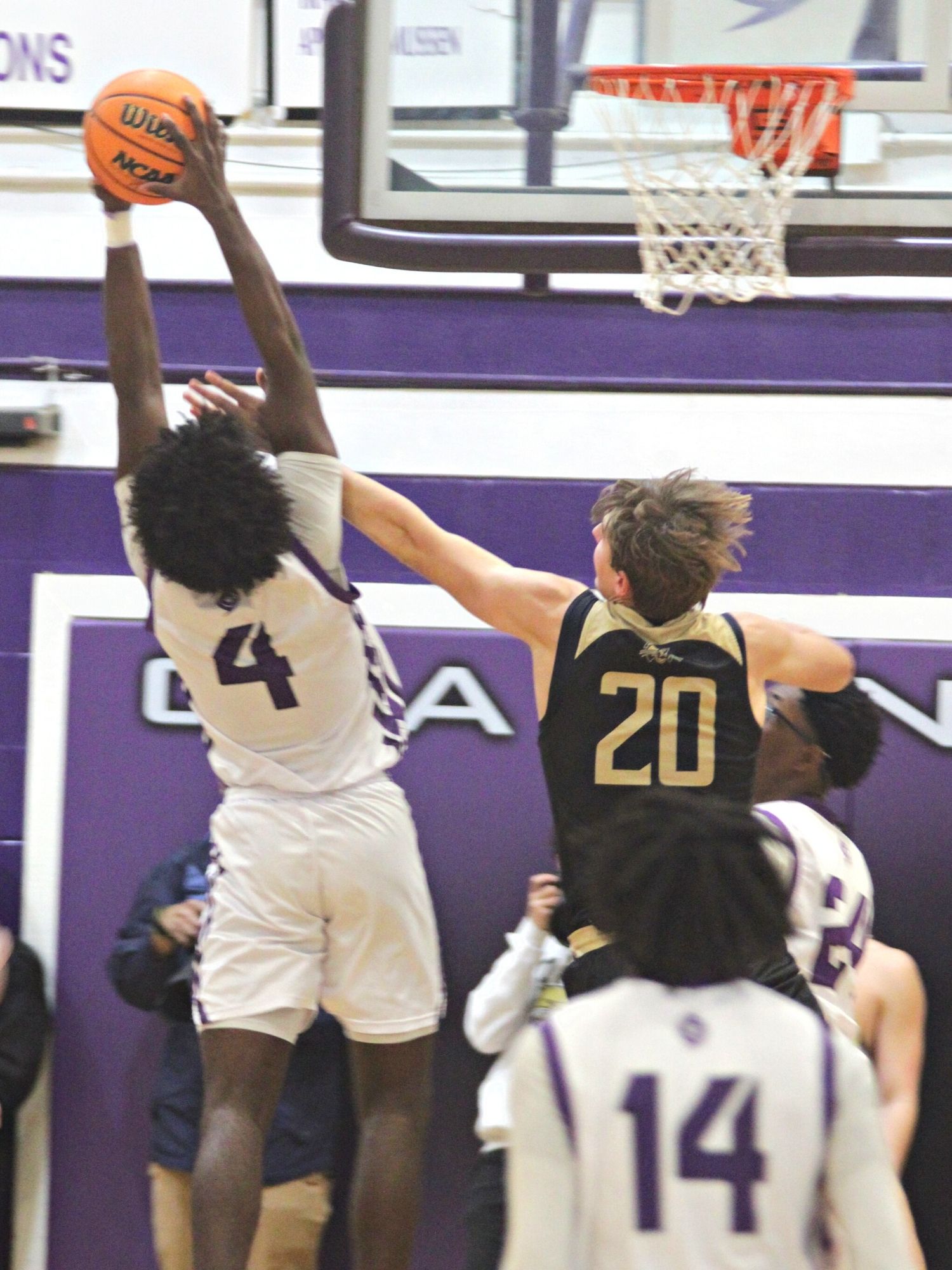 Gainesville's R.J. Hines attempts a shot against Buchholz's Anthony Wilkie