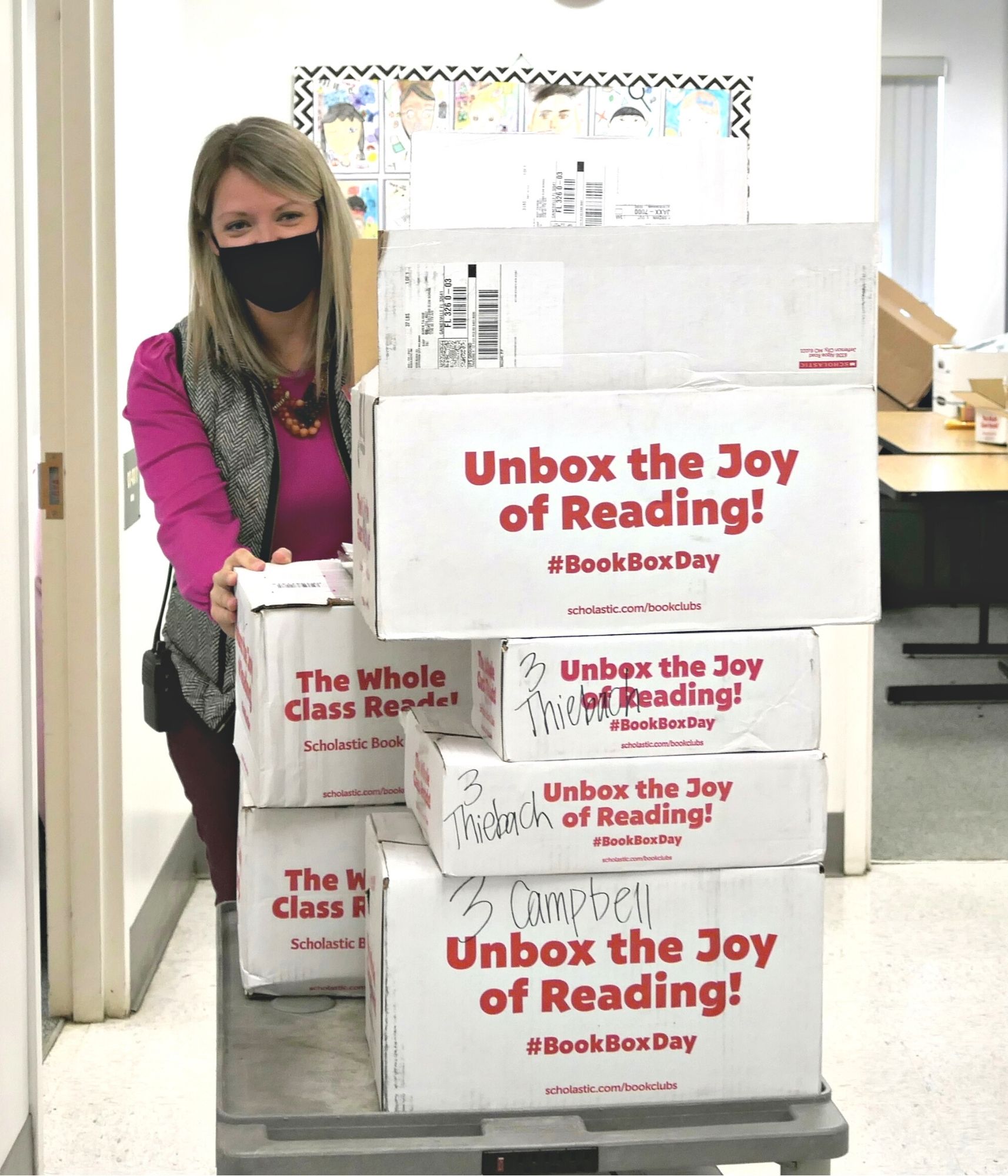 Teacher delivering Scholastic books at Williams Elementary