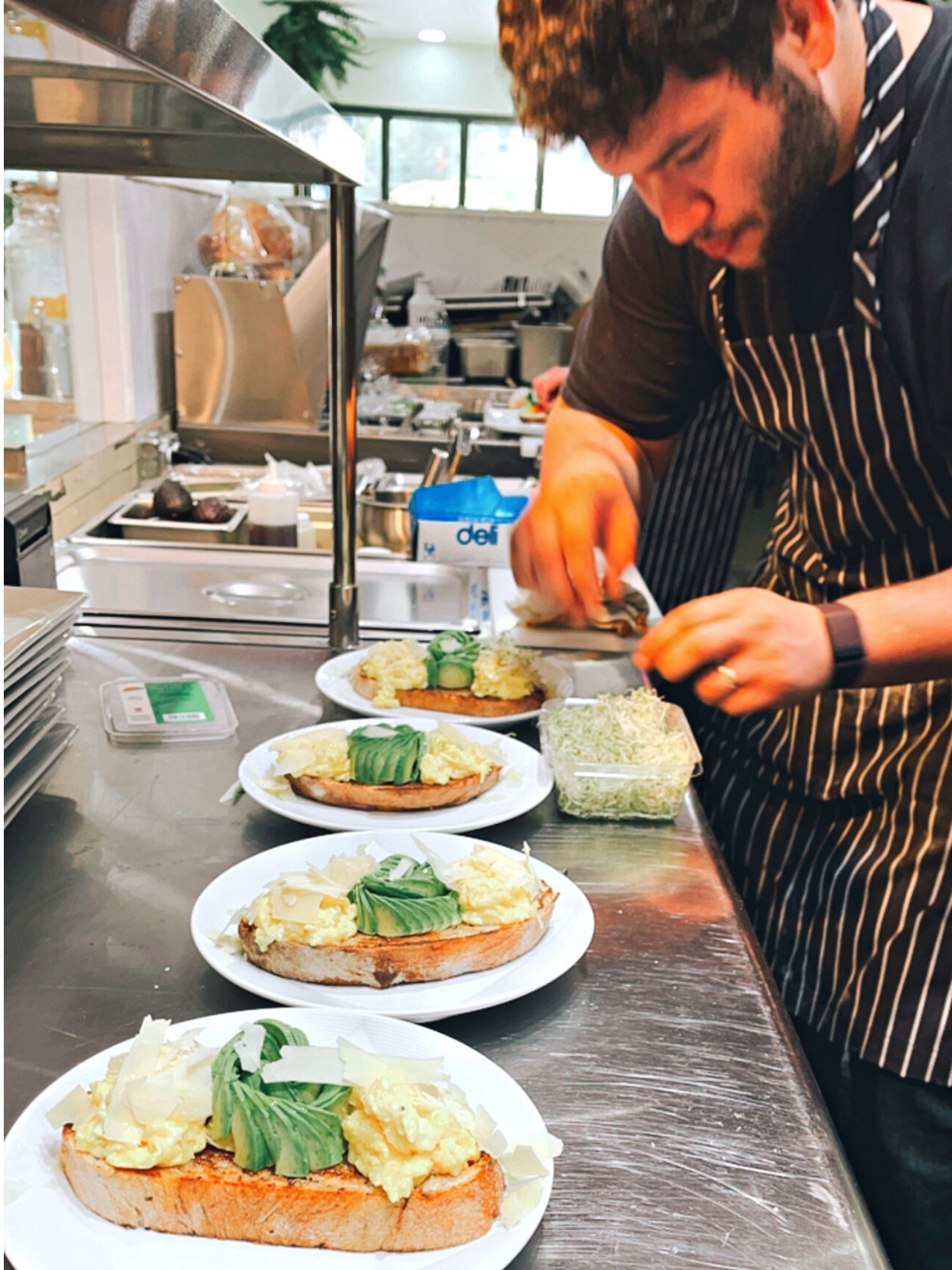Jorge Pino prepares egg toast plates