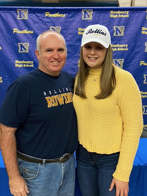 Grace Oelrich with Newberry volleyball coach Hank Rone