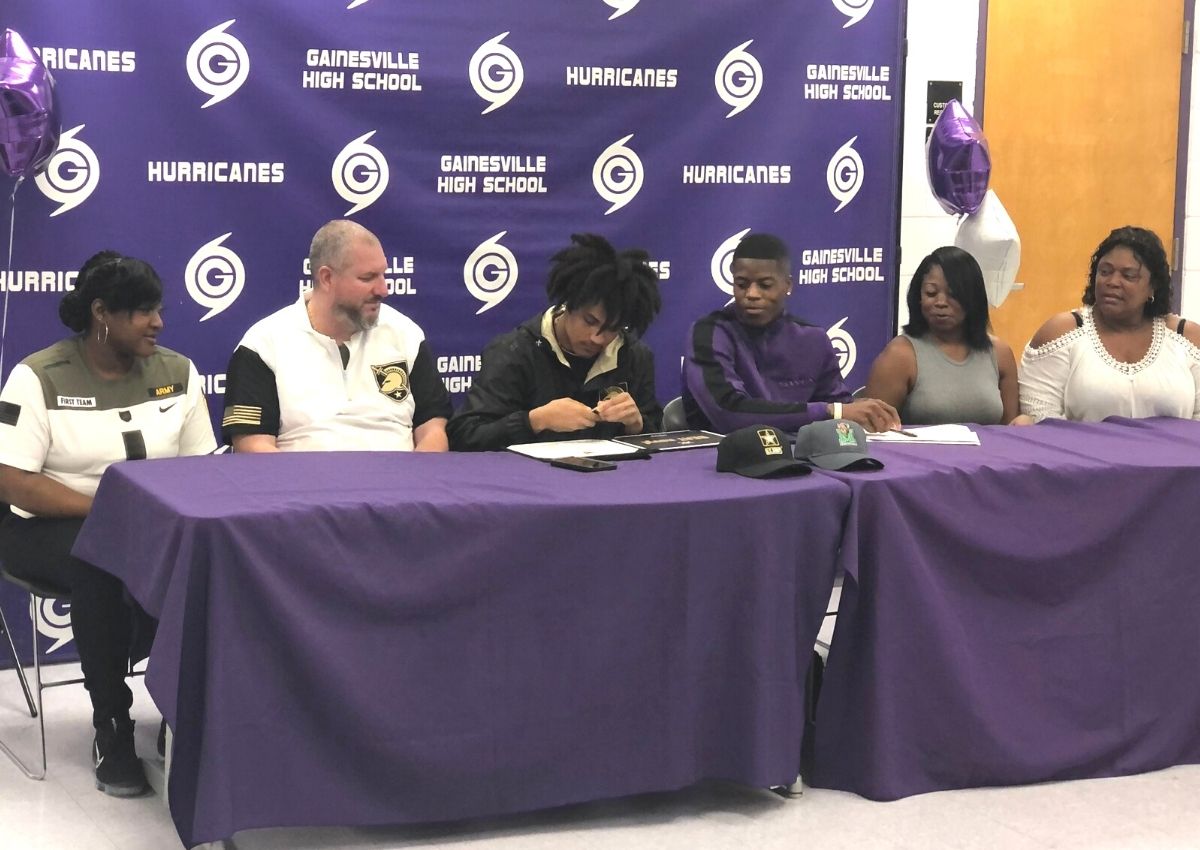 Gainesville High's Ryan Nolan signs his letter to play football at Army