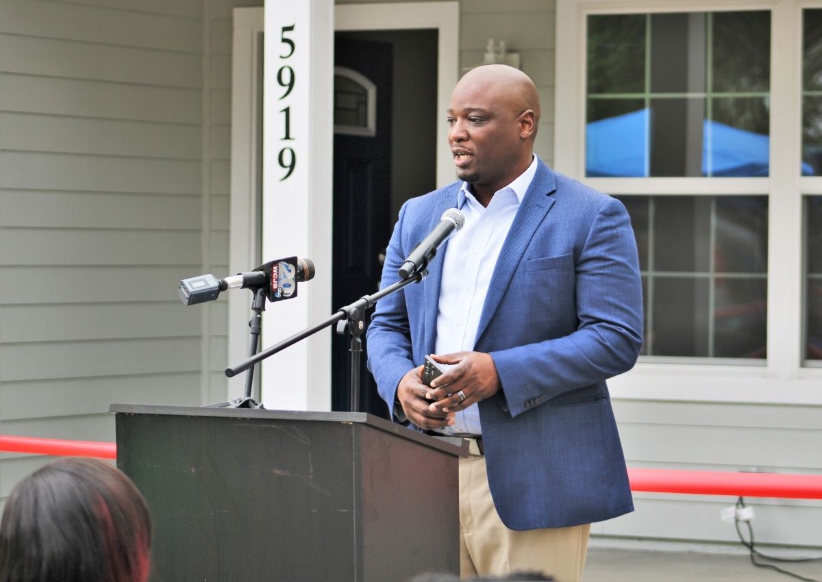 Michael Beard, president of Elevated, speaks at the ribbon cutting