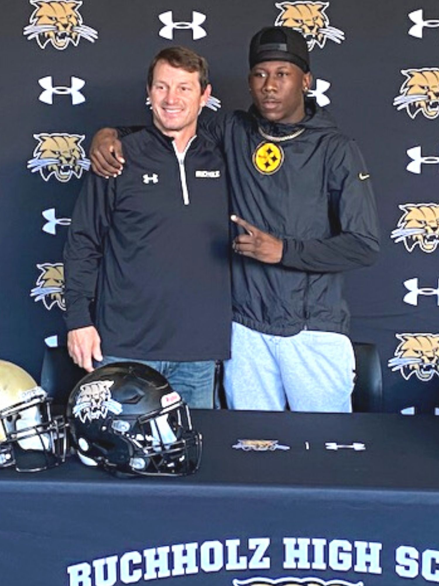 Buchholz HS football head coach Mark Whittemore and Quan Lee on UCF signing day