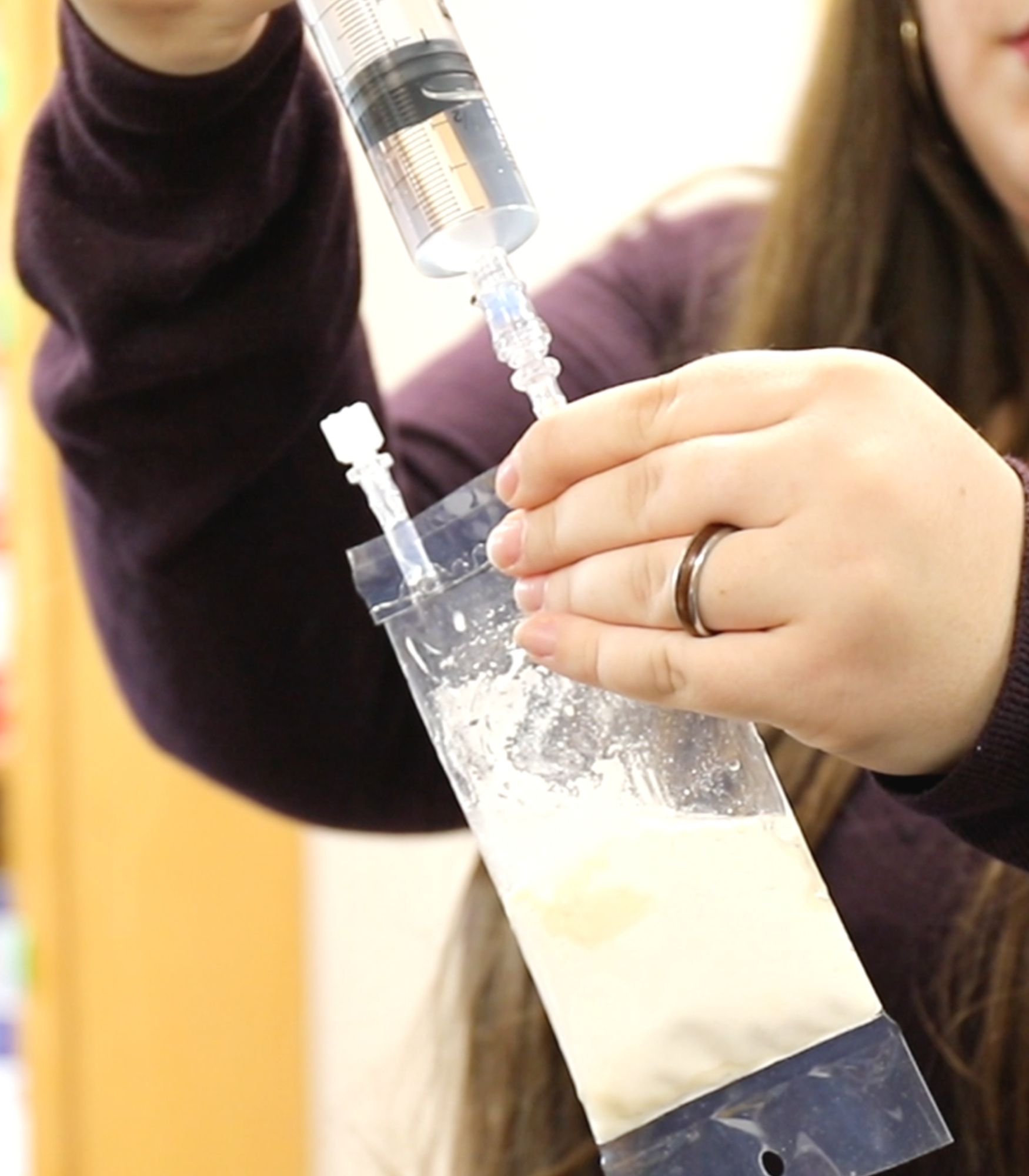 UF student Hope Hersh working on space bread