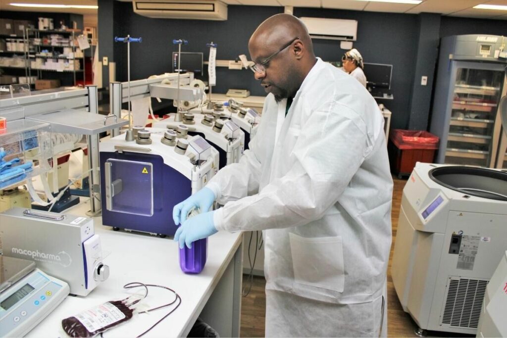 LifeSouth regional manager Kevin Jenkins prepares a blood unit.