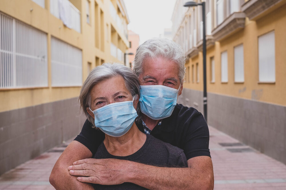 Couple wearing masks