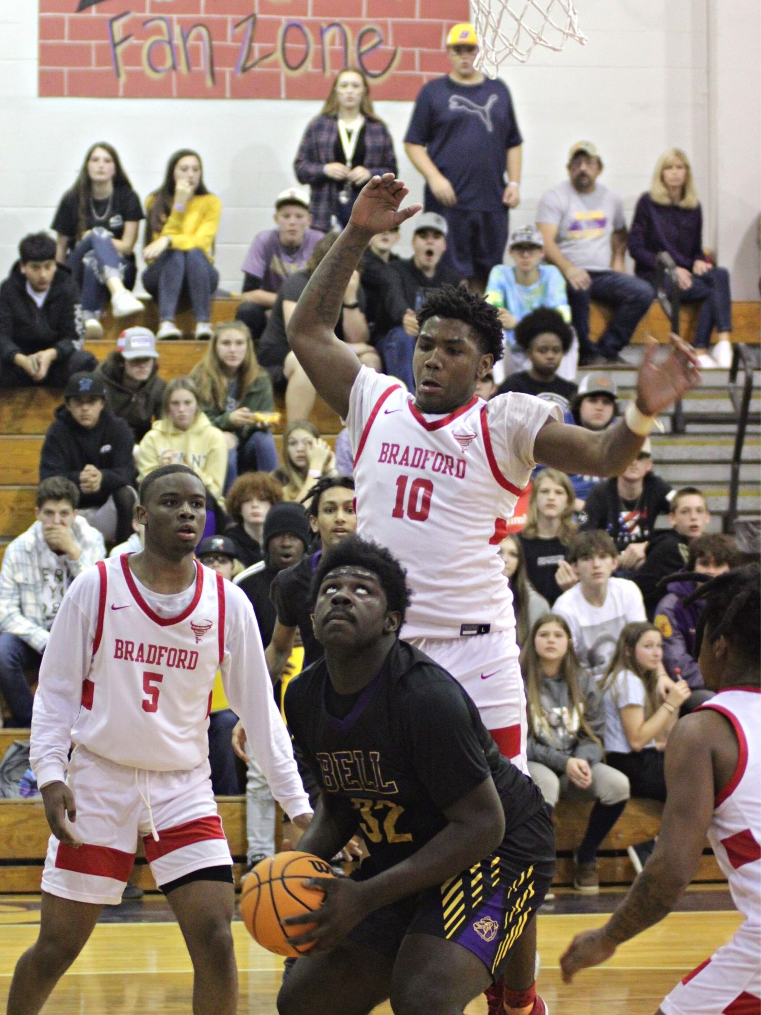 Bell's Daniel Pittman shoots defended by Bradford's Torrin Brazell