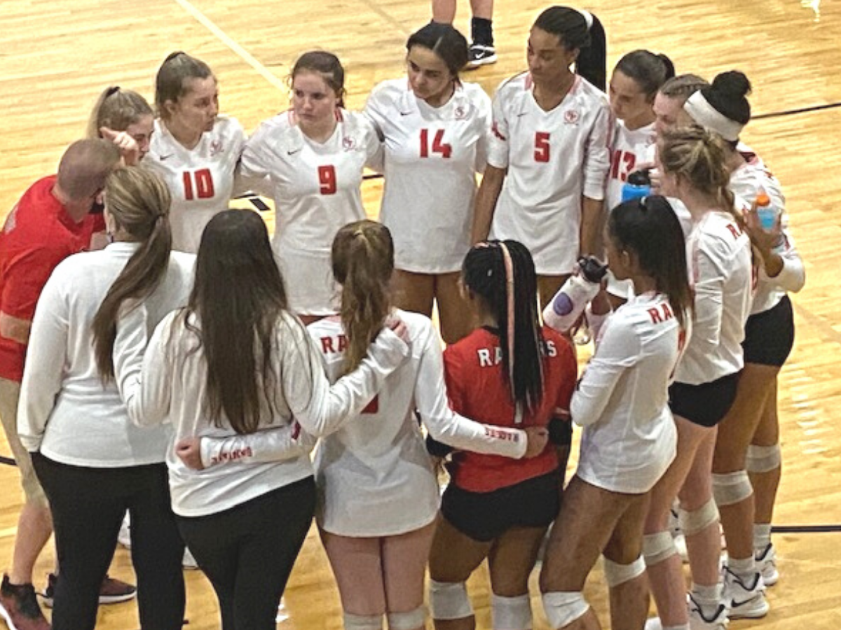 Santa Fe Raiders volleyball - team huddle