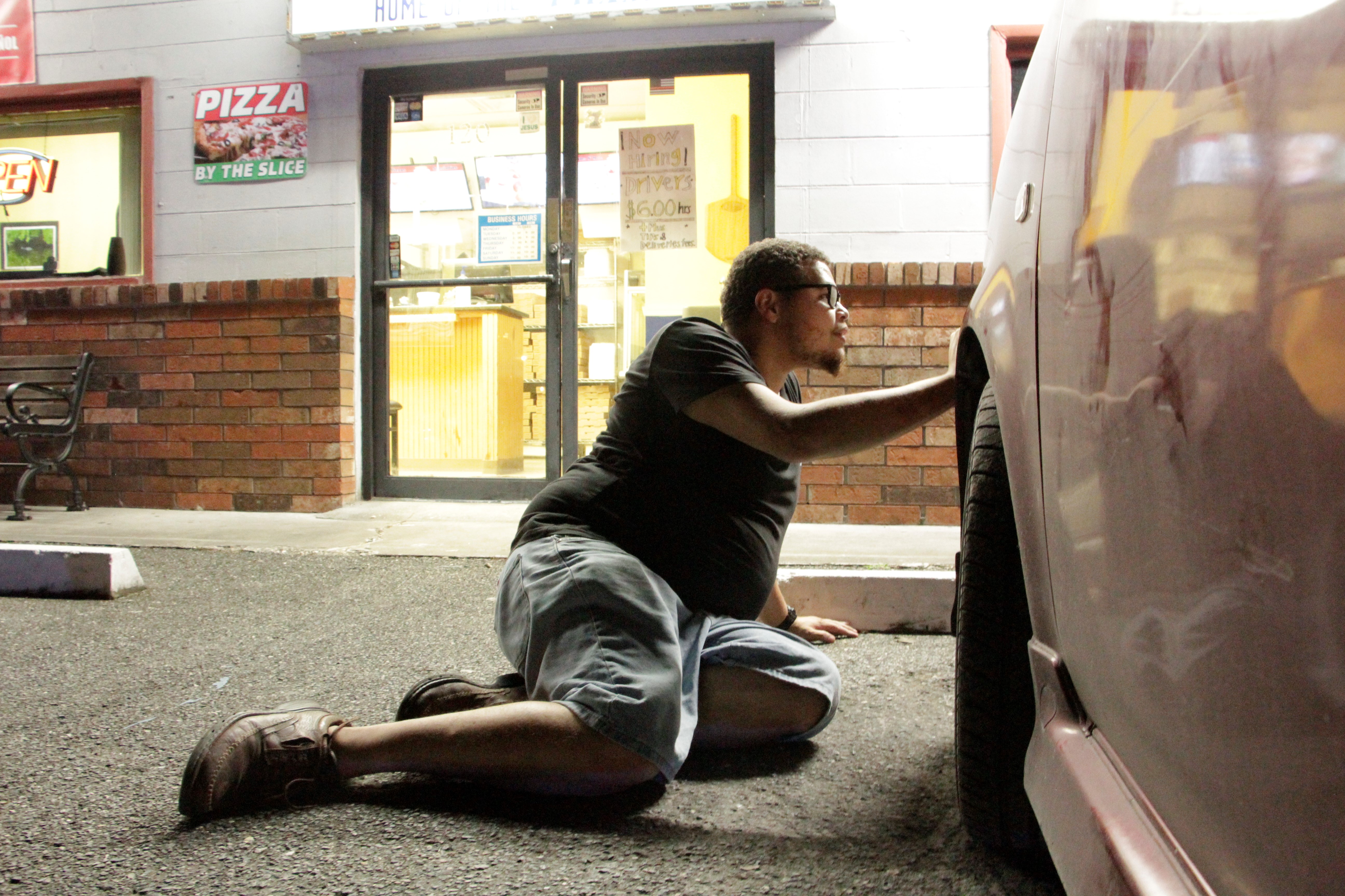 Newberry Pizza employee hides from shooter behind car