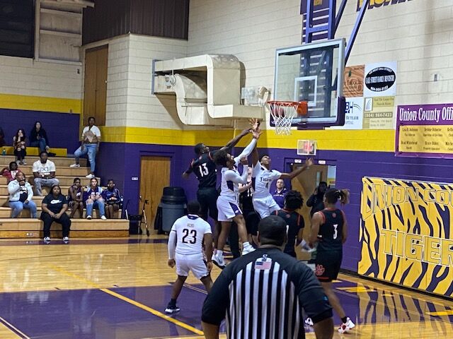 Union County goes up for a rebound against Baker County.
