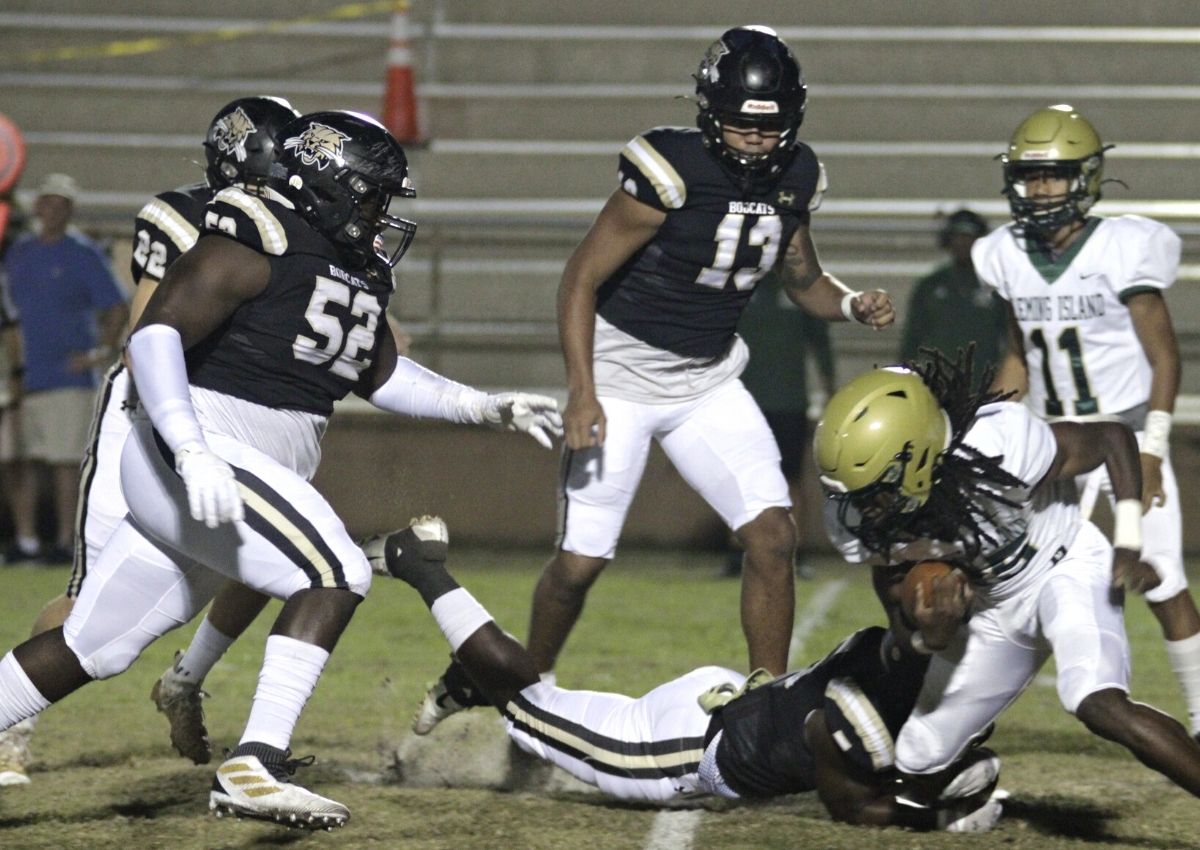 Buchholz's Jahari Clemons (52) and Daryus Boyd (13)