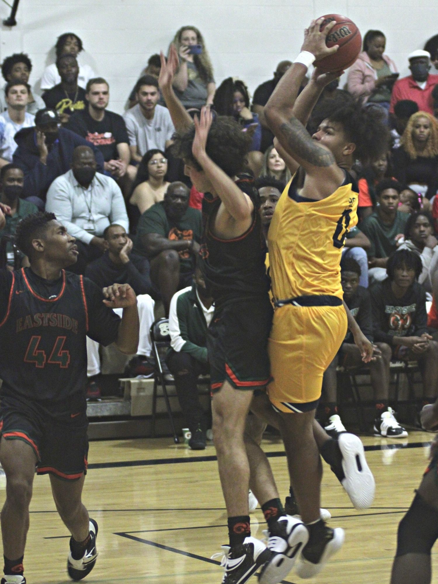 Buchholz's Daryus Boyd shoots for two of his seven points.