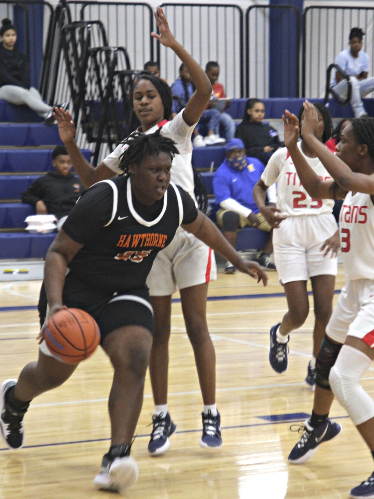 Hawthorne's Jhalea Jackson drives the baseline