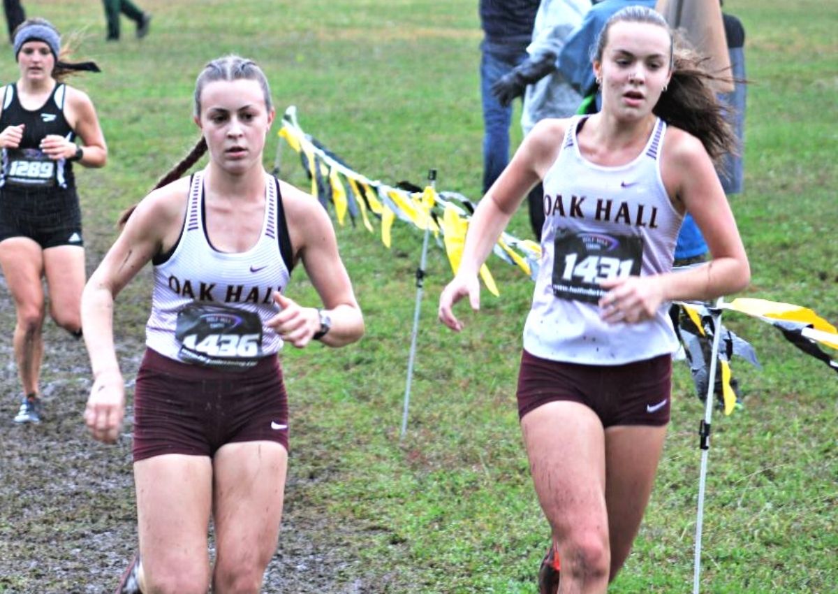 Oak Hall teammates Sydney Miller (left) and Alivia Dragstedt finished third and fourth, respectively, at Saturday's Region 2-1A Championships at Santa Fe College.