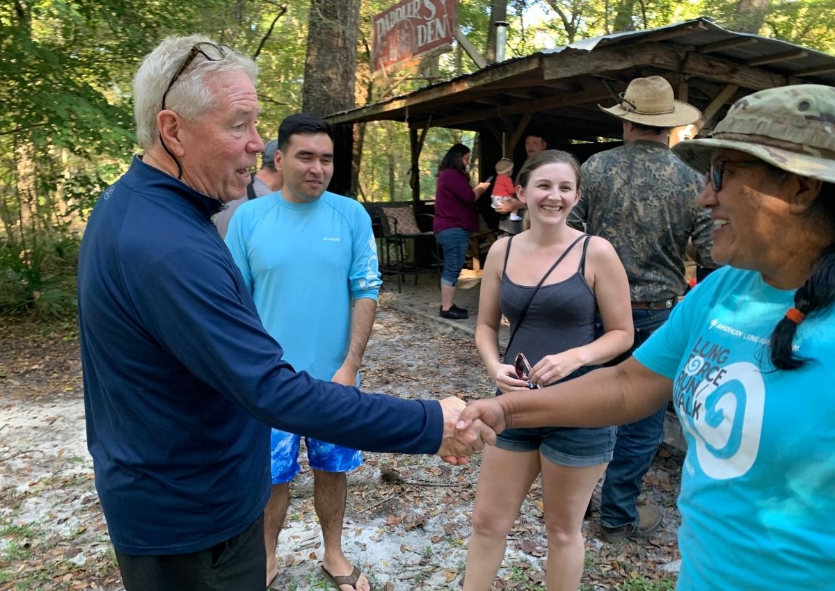Jim Wood greets Dyer family