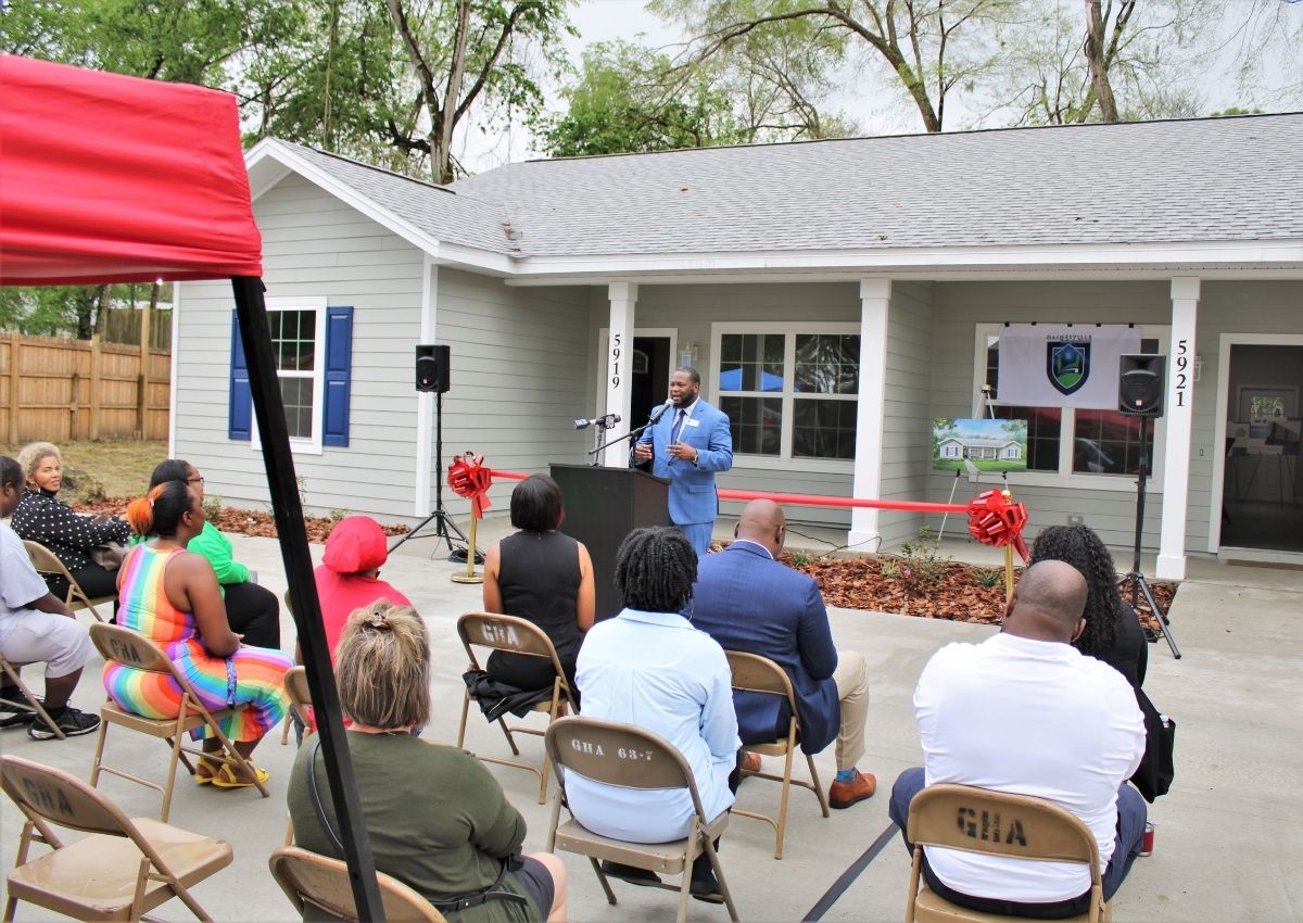 Malcolm Kiner, vice president at GHA, speaks at the ribbon cutting