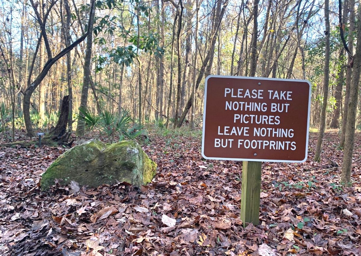 Devil's Millhopper Geological State Park sign