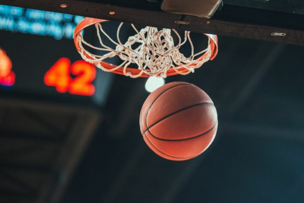 Basketball through hoop