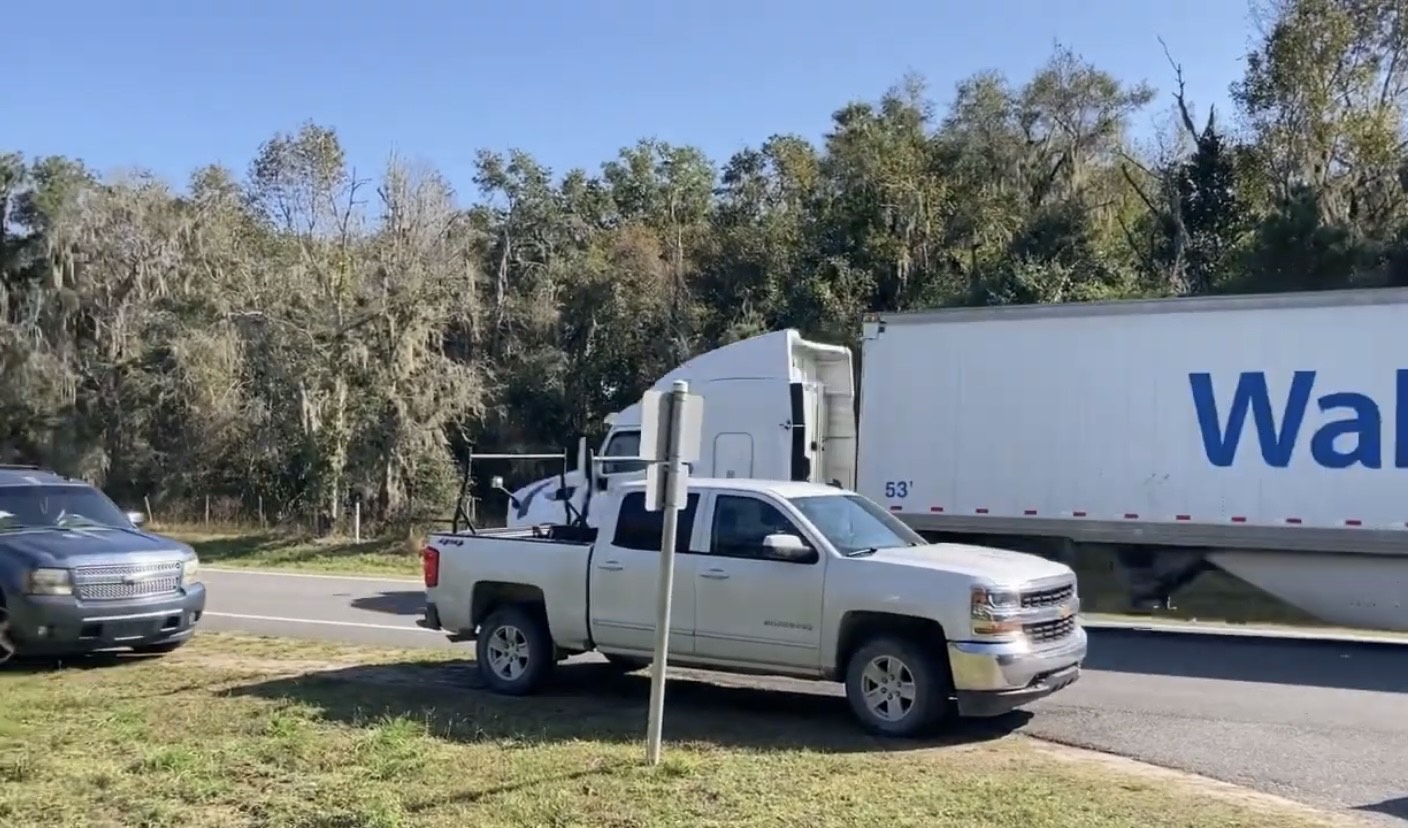 trucks passing Alachua Learning