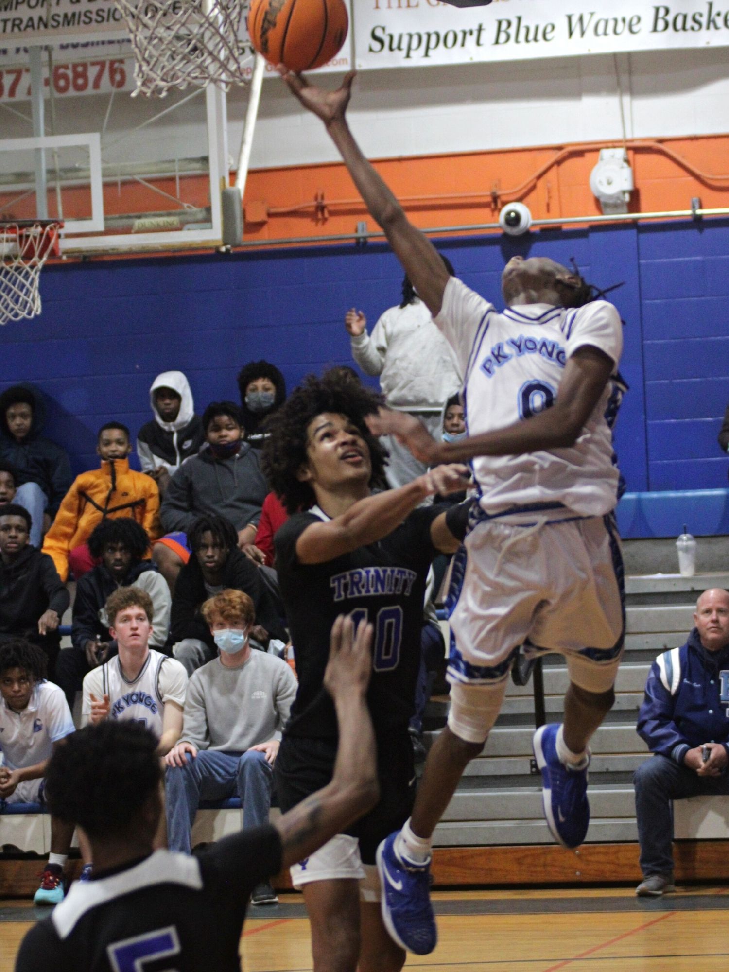 P.K. Yonge's Eli Harris drives to the basket