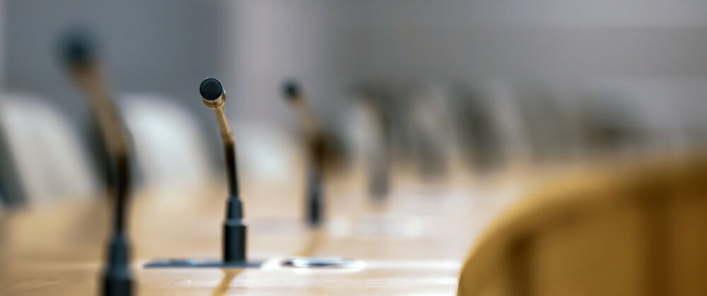 Microphones at board meeting