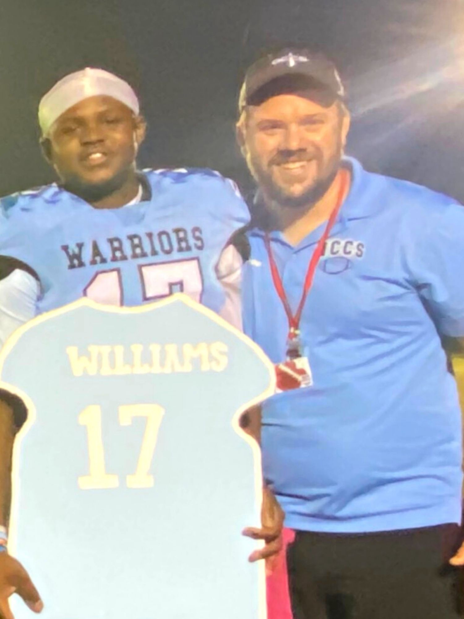 Gainesville Christian QB Jamarious Williams and coach James Schrader.