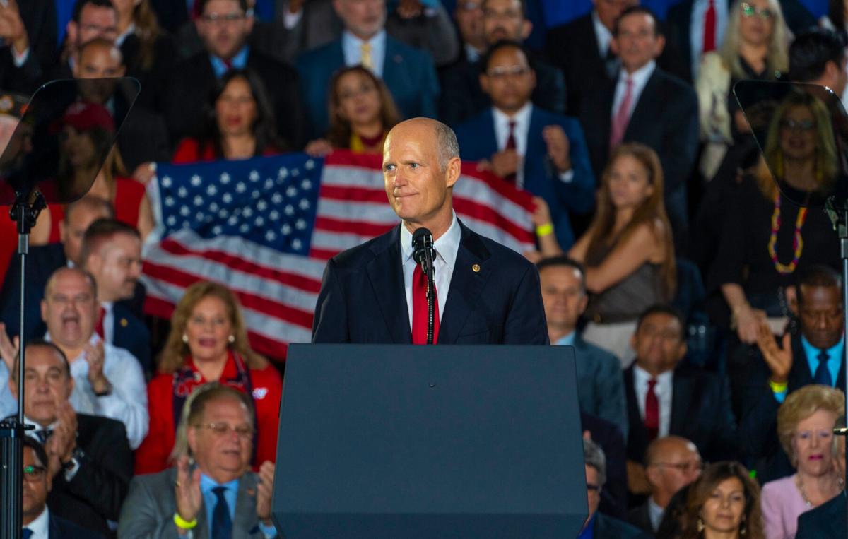 Sen. Rick Scott urges people to 'wear a mask' after testing positive for COVID-19