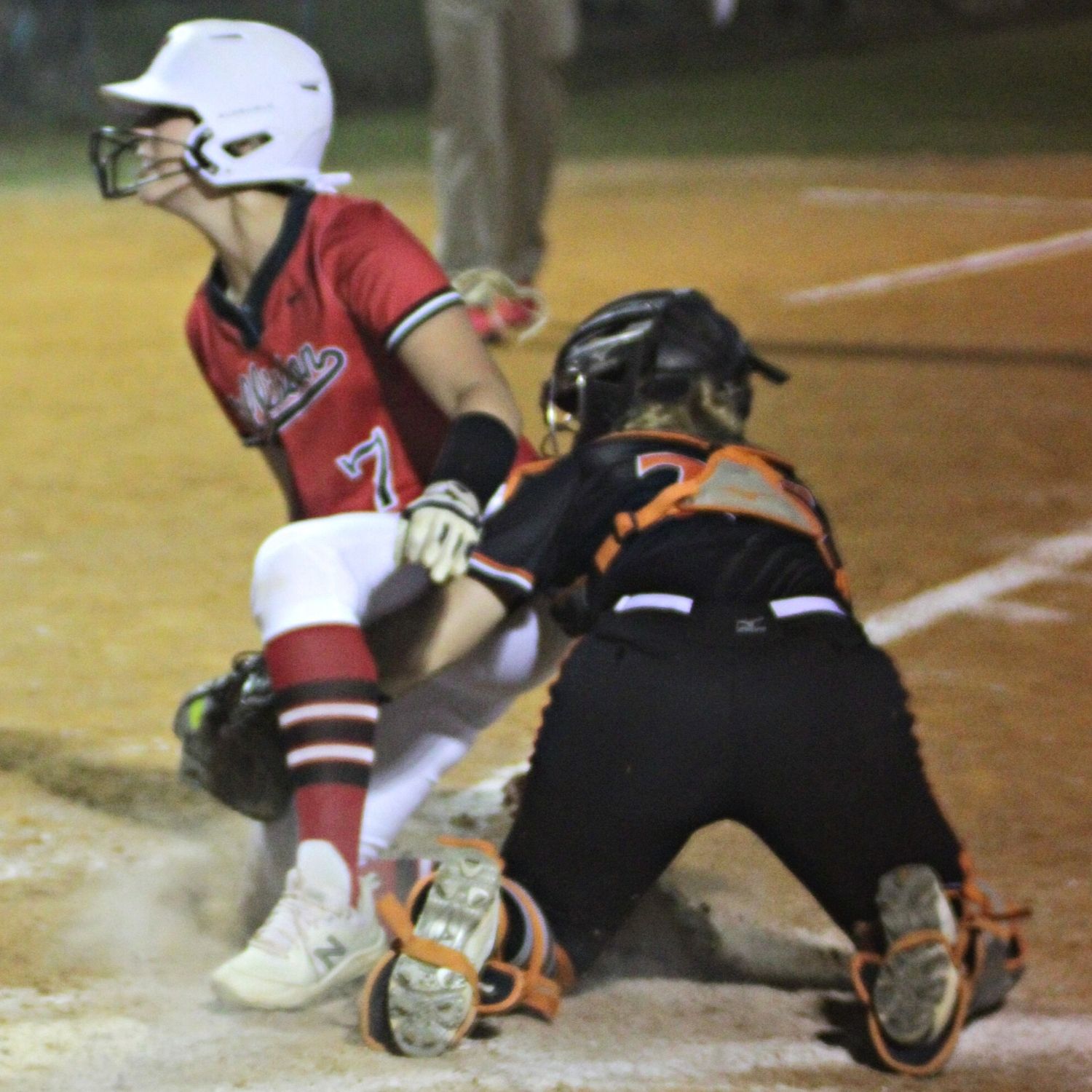 Trenton's Ella Emmons tags Williston's Raegan Geiger out in bottom of 5th