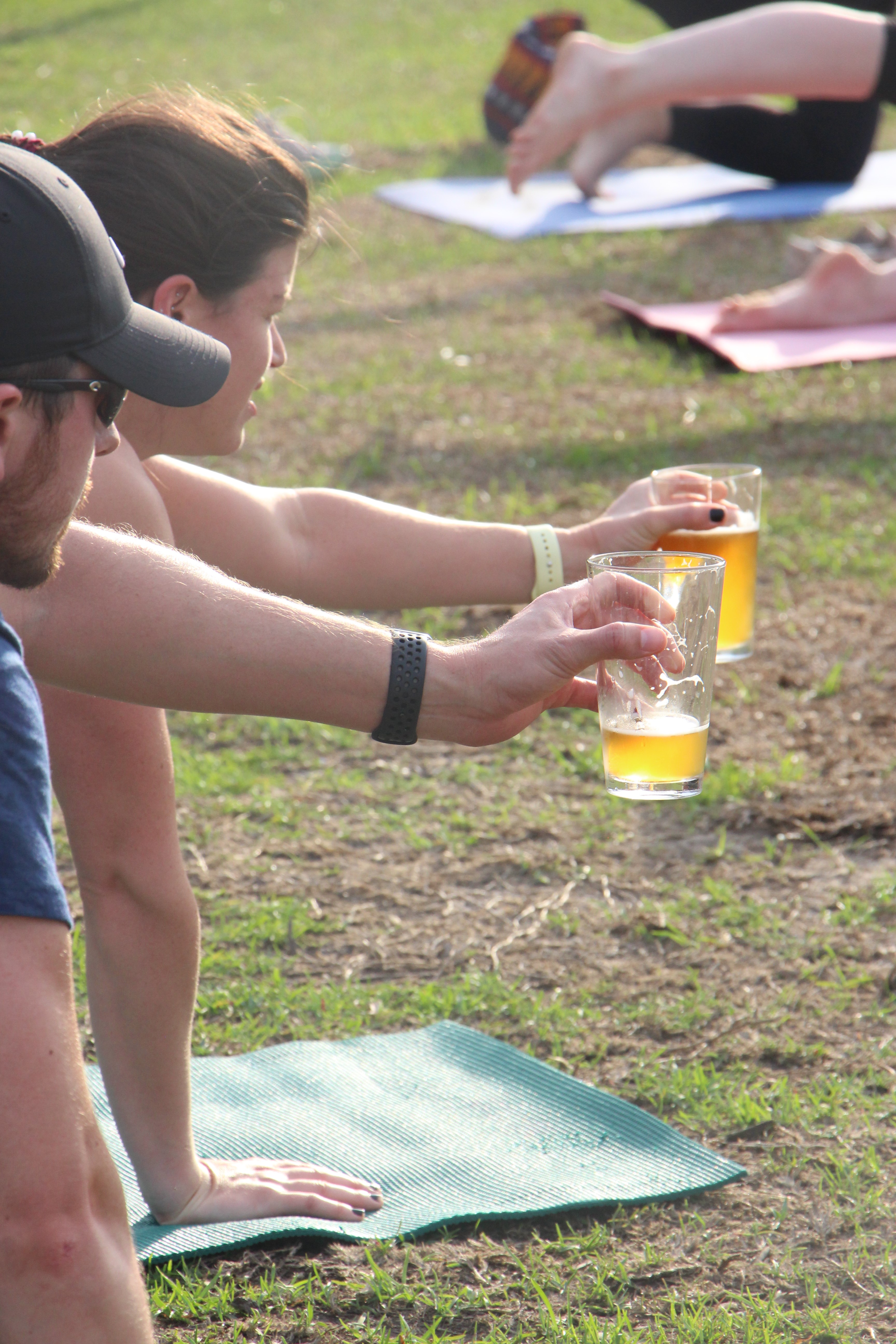 Yoga poses with beer cups