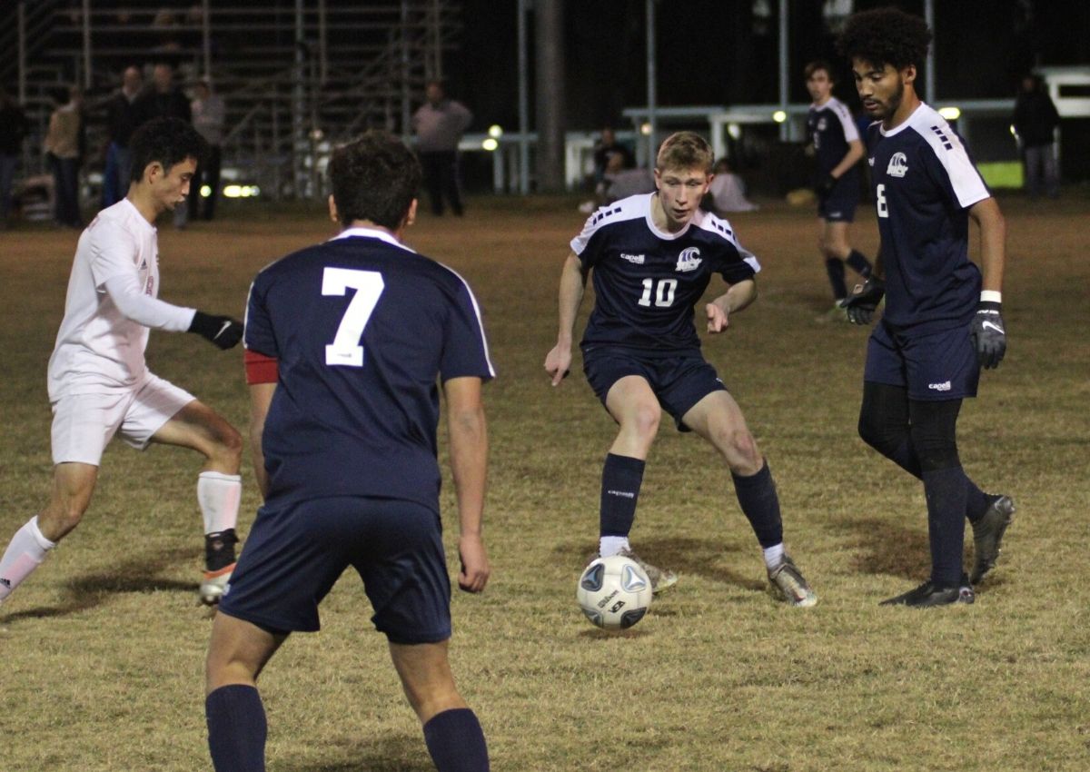 PK Yonge's Javier Blanco (10) and PK Alex Barnett (8) dribble