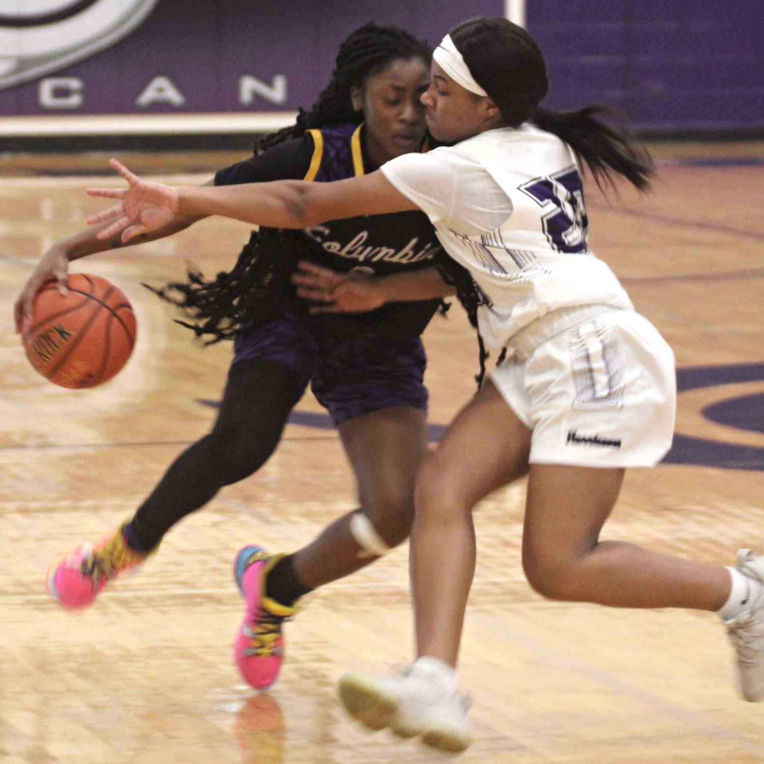 Columbia's Na'Haviya Paxton defended by Gainesville's Amariah Jackson