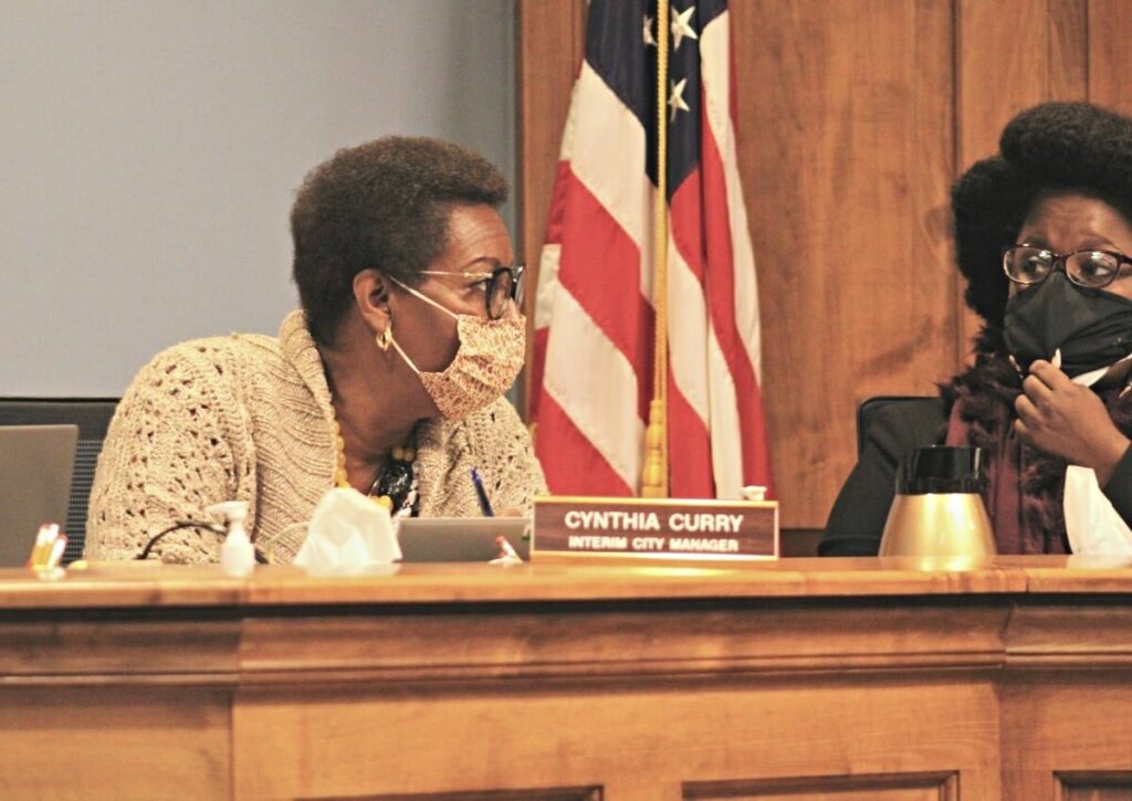Interim City Manager Cynthia Curry participates in a Gainesville City Commission meeting.