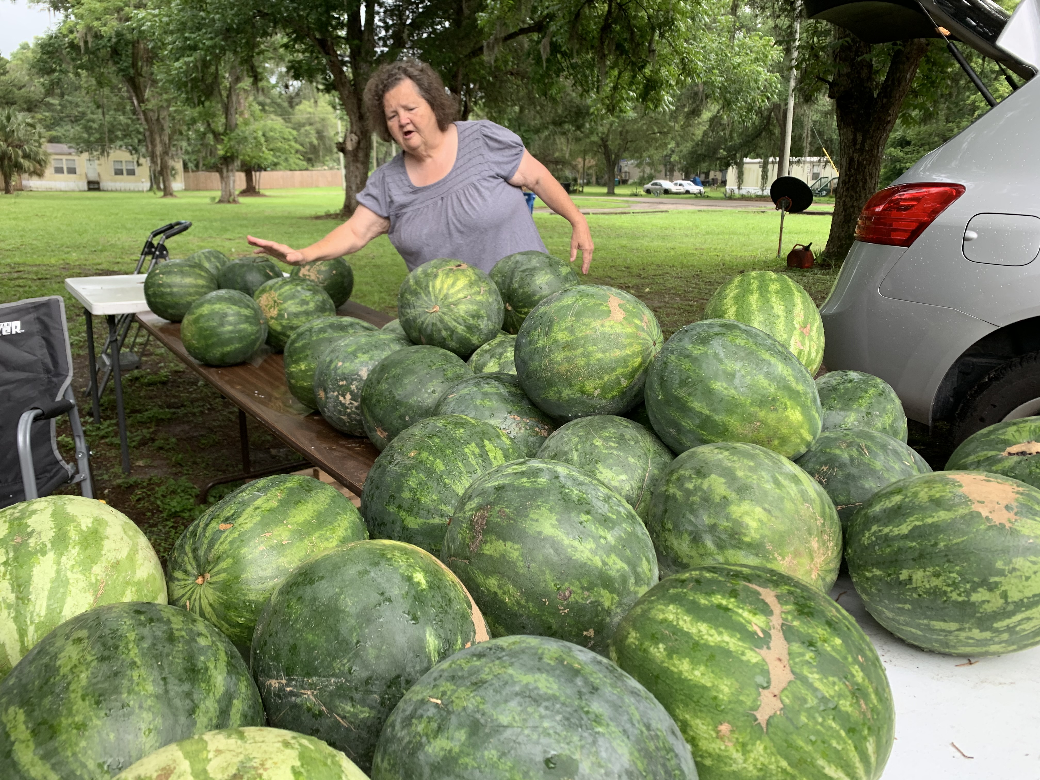 Paula Hogg with her watermelons for sale