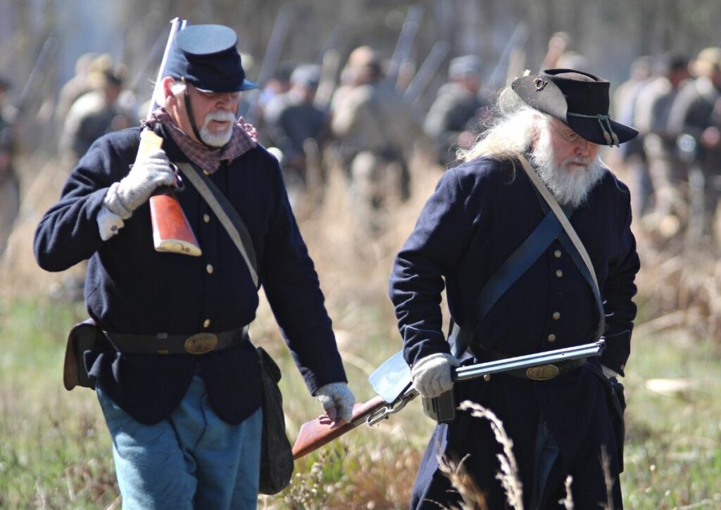 Union infantrymen march forward at the Civil War-era battle reenactment during the 46th annual Battle of Olustee reenactment weekend on Saturday.