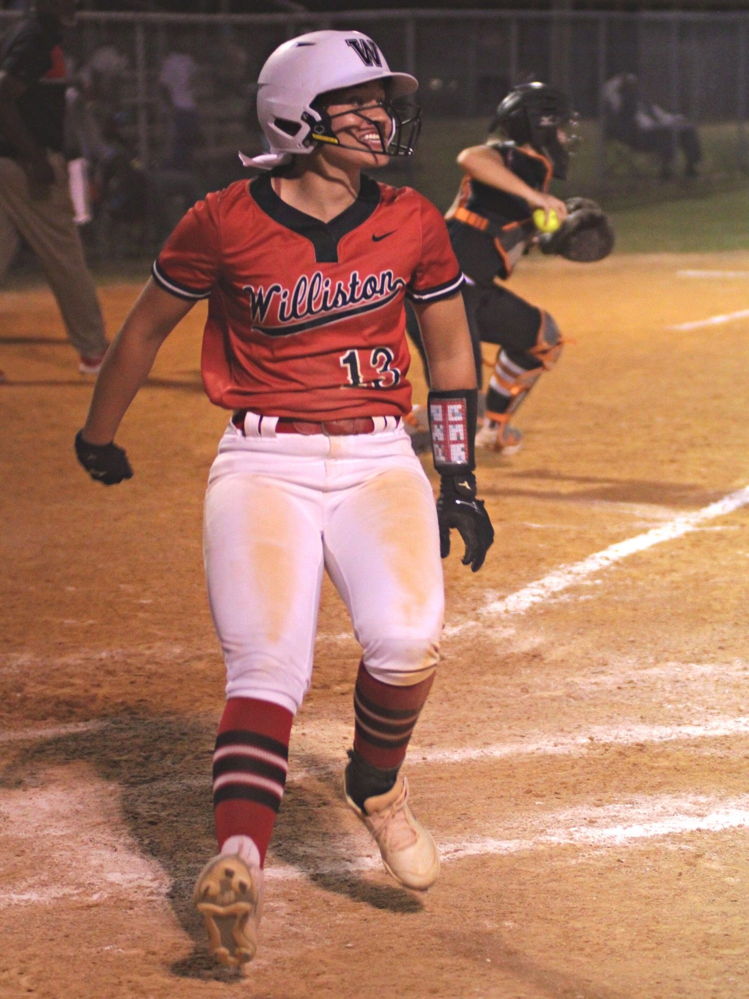 Williston's Olivia Davis scores walk off winning run