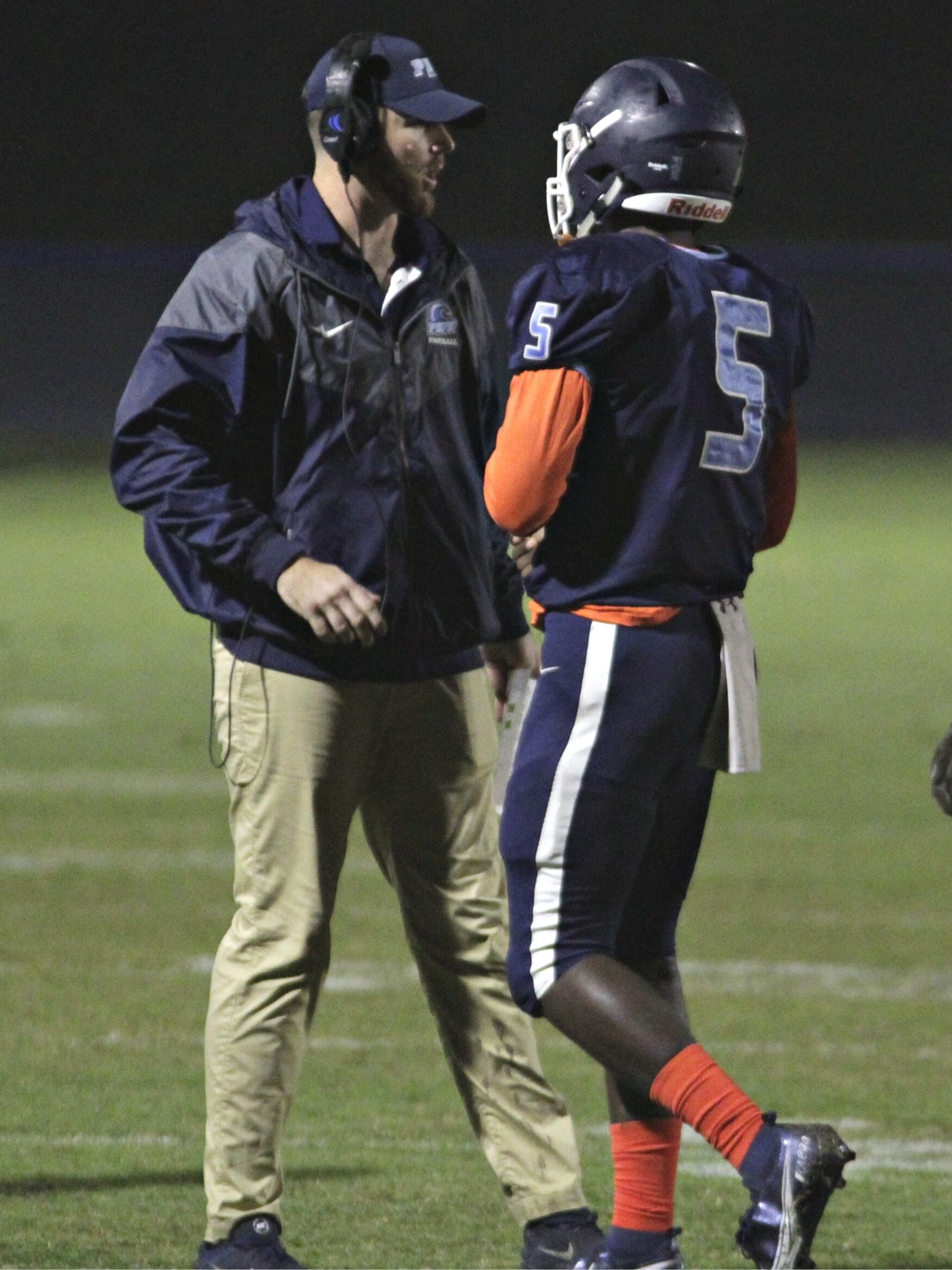 P.K. Yonge head coach Kevin Doelling and QB AJ Small Jr.