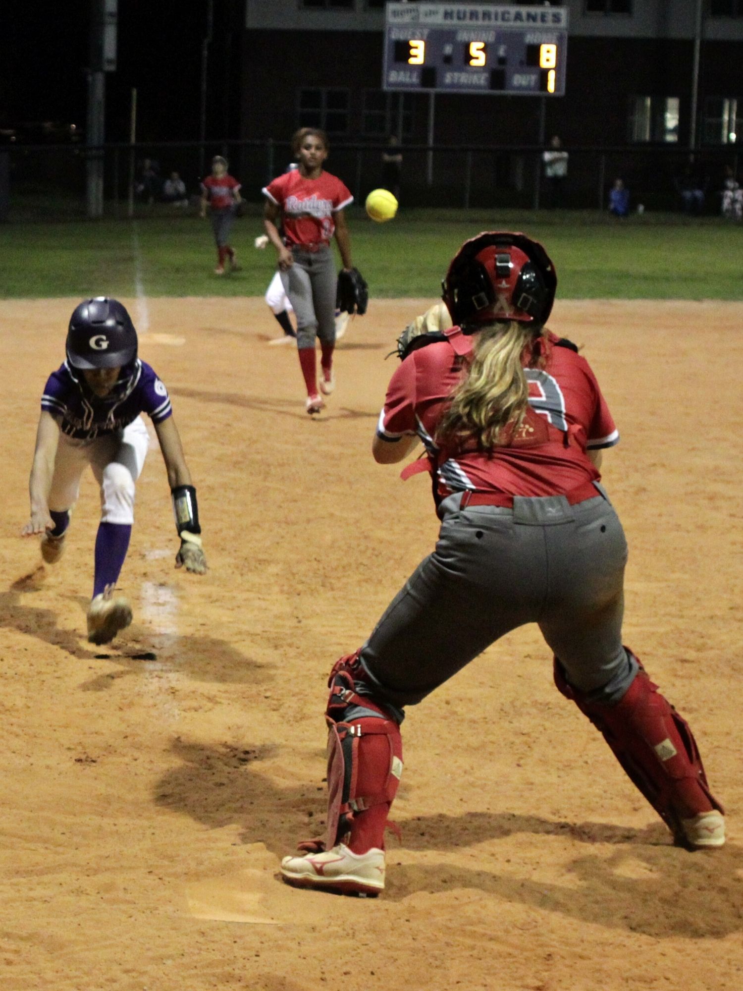 Gainesville's Aa'laysia Williams gets tagged out on Grace Mattson's throw to Shelby Coonce