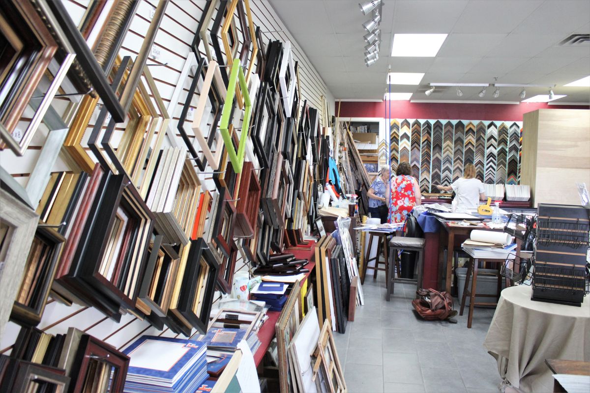 Frames hang along the wall at Picture This! Frameshop and Gallery