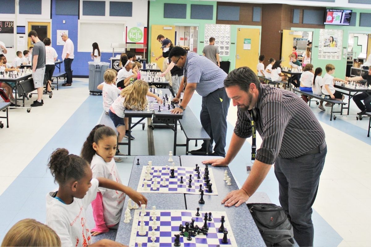 Three students each faced off challengers in simultaneous matches