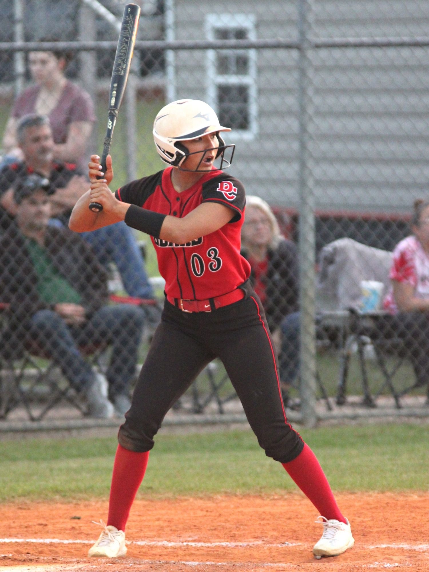 Dixie County shortstop Juliann Smith at bat