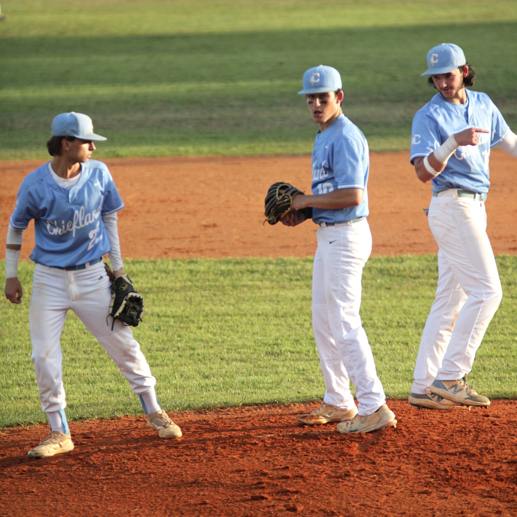 Chiefland's Colton Brown (22), Seth Campbell (19) and Wade Gore (14)