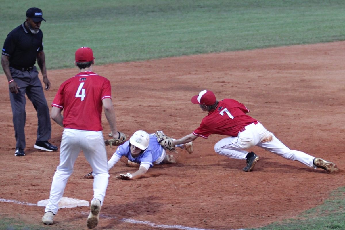 Dixie County's Kade McCaskill tags Chiefland's Colton Brown out at 3b in top of 5th for 2nd out