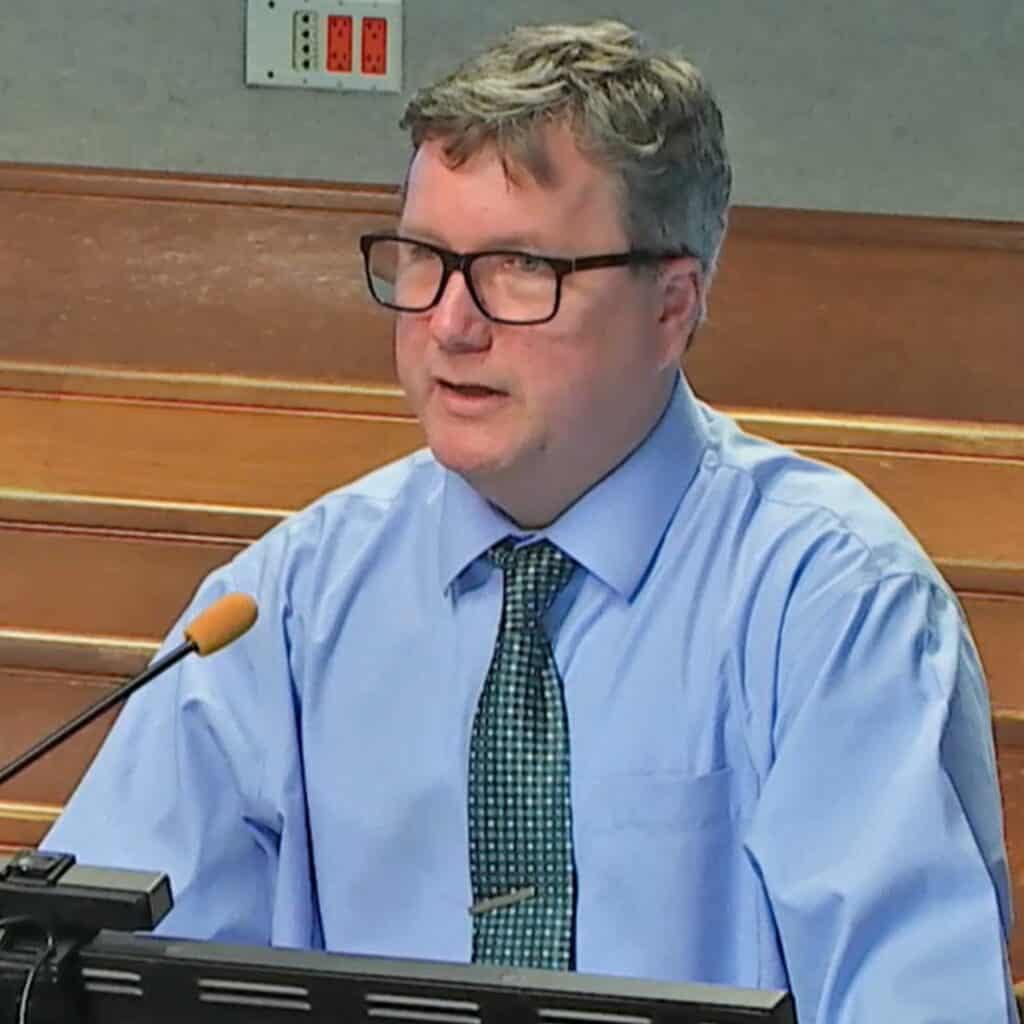 Jeffrey Hays, Alachua County principal planner, speaks before the county commissioners