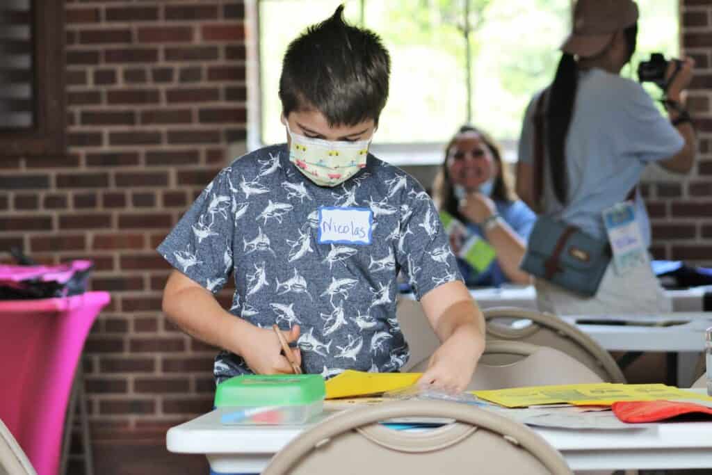 Nicolas cuts out his cube at Saturday's event.