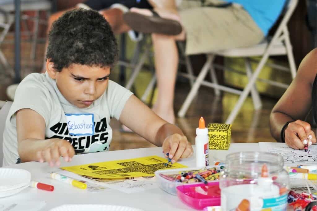 Sebastian works to finish his 2D cube before turning it virtual