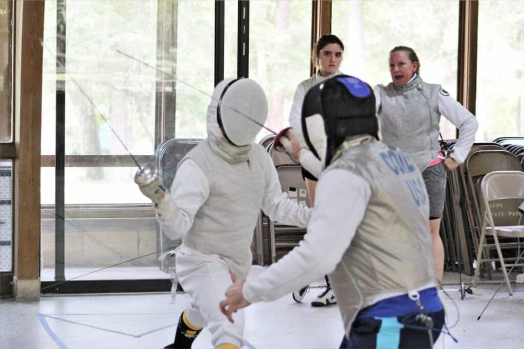 Students spar at Diaz' training camp