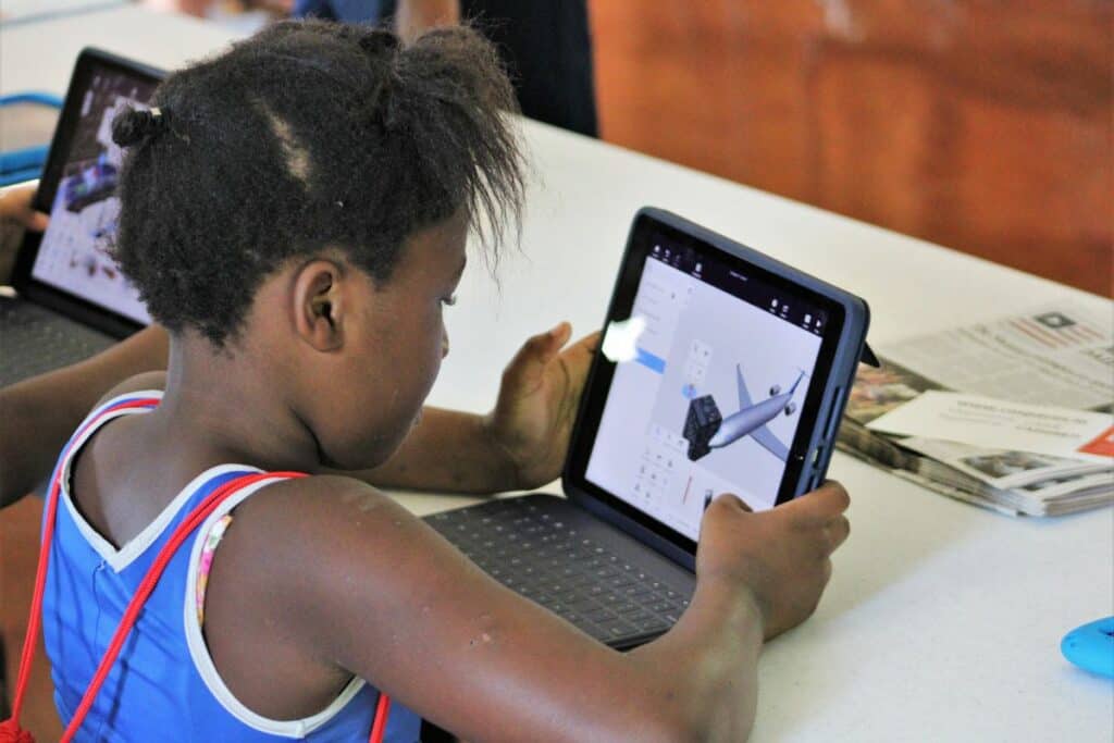 Sunjai adds digital elements to her cube.