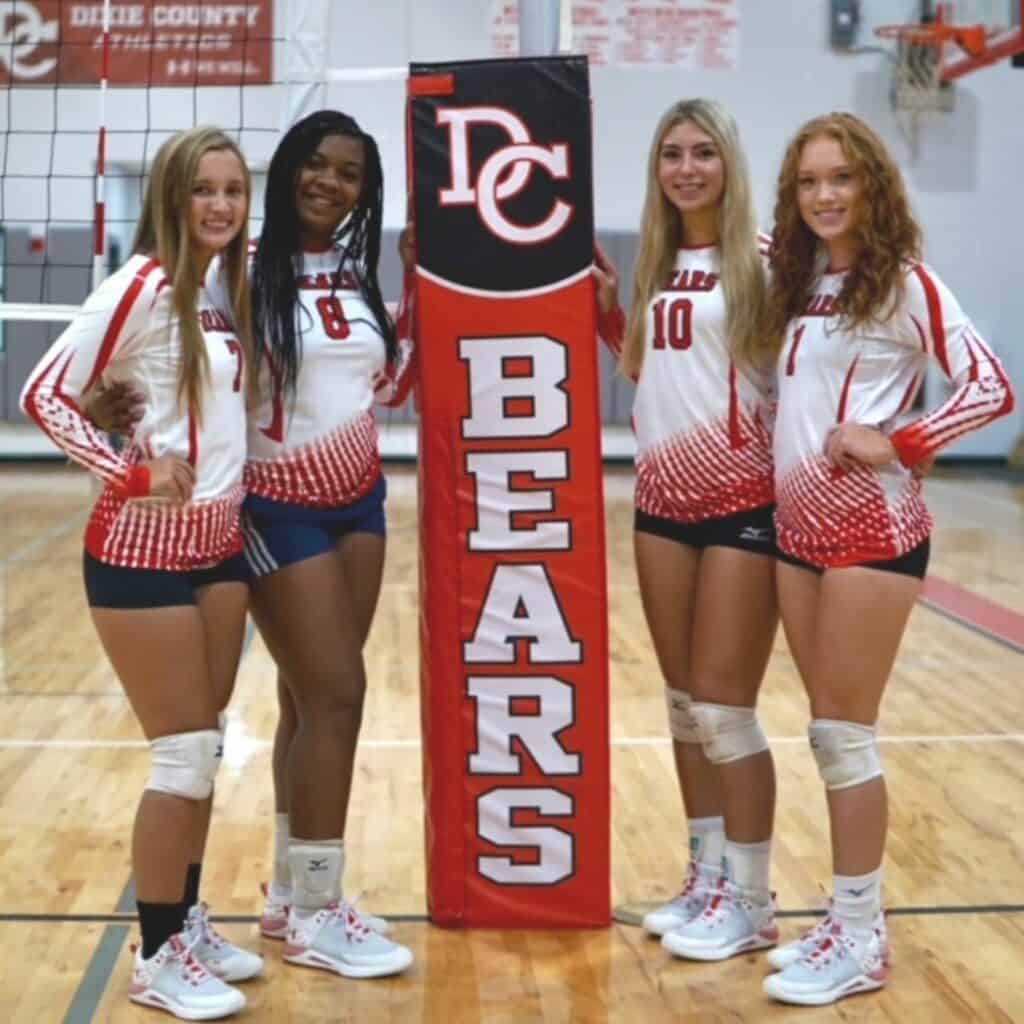 Dixie County volleyball returning starters Peyton Hatcher (7), Paris Williams (8), Anna Ellison (10) and Katie Roberts (1)