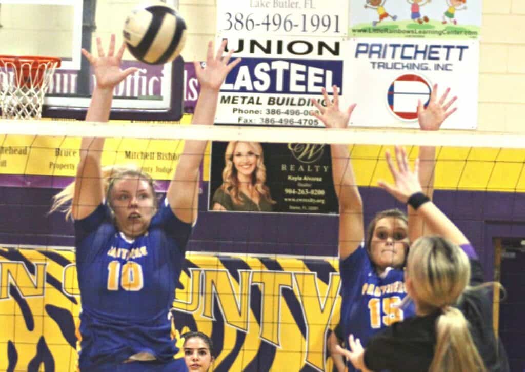 Newberry volleyball Alexis Boyd (10) and Chloe Jones (15)